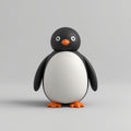 Pingüino articulado impreso en 3D en PLA negro, blanco y naranja. Imagen ilustrativa generada con IA; la pieza real impresa puede variar ligeramente.