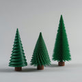 Set de tres árboles de Navidad decorativos impresos en 3D en PLA verde. Imagen ilustrativa generada con IA; la pieza real impresa puede variar ligeramente.